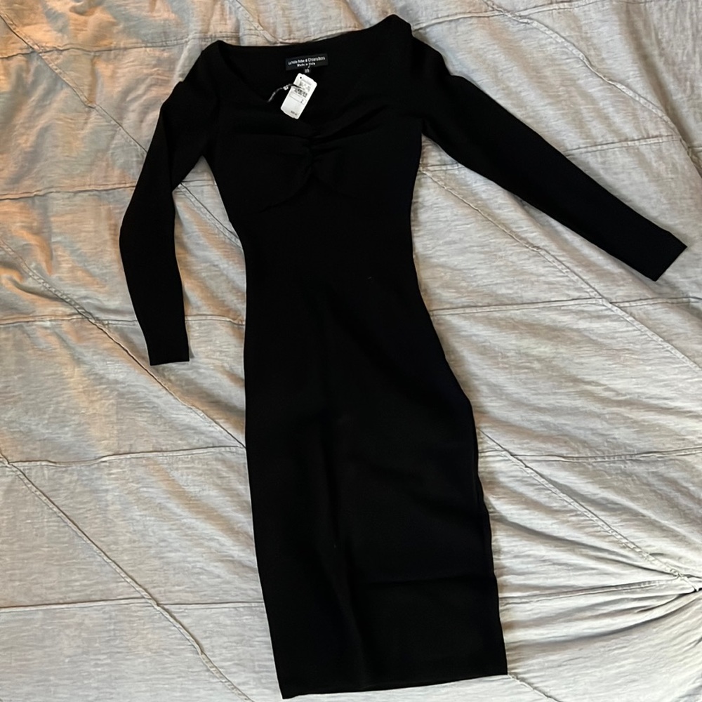 Elegant long sleeve formal or cocktail dress.